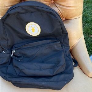 Dutch Bros Black Backpack with Yellow Logo